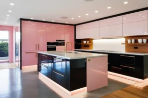 A Blush Pink Modular Kitchen with Sleek Overheads